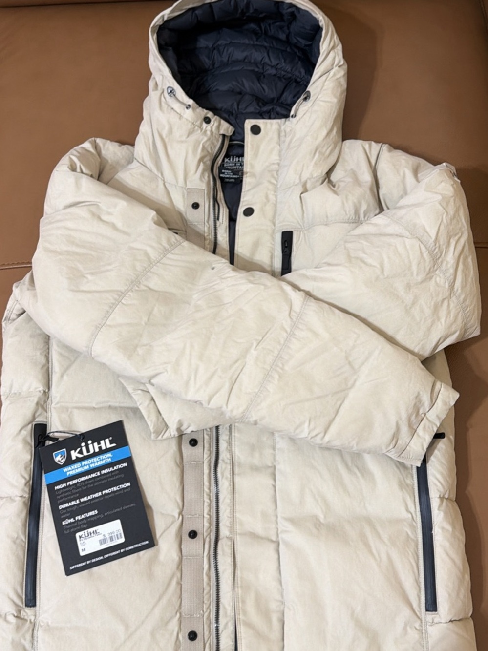 Kuhl Men's Hooded Puffer Jacket — Cream with Black Lining